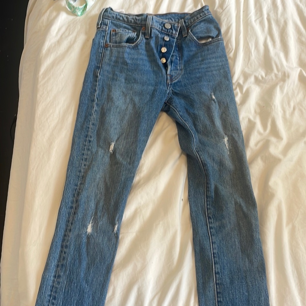 Levi’s 501 skinny denim blue with distressing